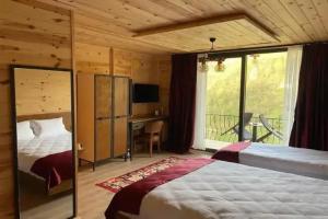 Yamaçda Suit Otel, Camlihemsin