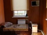 Single Bed in Dormitory Room