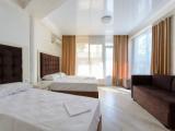 Standard Quadruple room with balcony and with city view