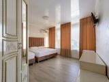 Standard Triple room with balcony and with city view