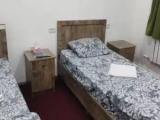 Single Bed in Dormitory Room