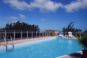 Apartment with One Bedroom in Grand Baie, with Pool Access, Furnished Garden and Wifi, Grand Bay