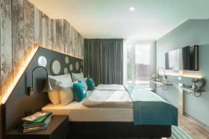 Holiday Inn - the niu, Brass Munich Olympiapark by IHG, Munchen