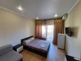 Superior Triple room with balcony and beachfront