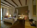 Standard Room with poster bed and pool view - Non- Smoking (Avail 15% Discount on F&B)