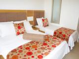 Deluxe Triple room with balcony and beachfront