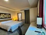 Deluxe Quadruple room with balcony