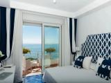 Deluxe Triple room with partial sea view