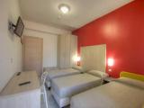 Standard Quadruple room with balcony and with partial sea view