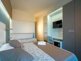 Standard Quadruple room with garden view