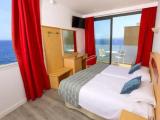 Standard Quadruple room with partial sea view