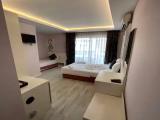Standard Triple room with balcony and with city view