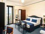 Deluxe Triple room with balcony and with sea view
