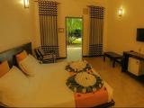 Deluxe Triple room with garden view