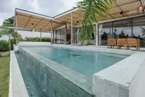 Tropical Poolside Retreat by Sea N' Rent Apartments, Haad Yao