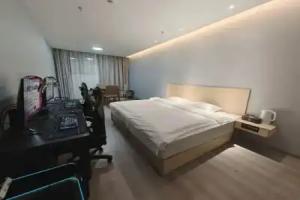 Peach Boutique Hotel (Xinyang Qiansheng Department Store Railway Station), Xinyang
