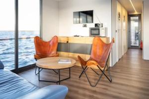 exclusives Hausboot "Oma Ella" Cottage, Heiligenhafen