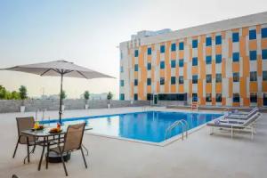 VOGO Grand Hotel - Formerly Best Western Plus Hotel Academic City, Dubai