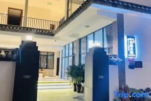 Dali Shuanglang Muhan Courtyard Hotel