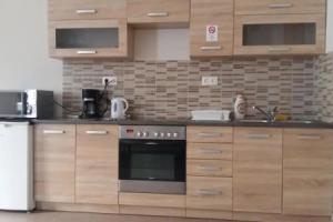 Váralja Apartman, Tata