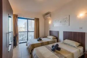 GetawaysMalta - Seashells 2-Bedroom Apartment in Bugibba, Qawra