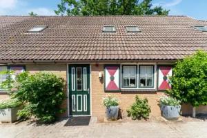 Group Home in With Waterside Terrace Tourist base, Giethoorn