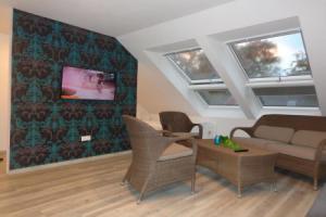 Ostfrieslands Perle Ferienwohnung an der Nordseeküste, Sauna, Terrasse, Garten, ruhige Lage, WLAN Apartments, Norden