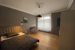 Room-zimmer mit Stuck in Co-living Apart, Offenbach