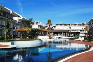 Tropical Gardens a 2 bed private home Sleeps 5 persons with sofa bed in lounge Apartments, Side