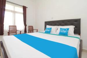 Airy Utara Srikarya 3E Bali Hotel, Denpasar