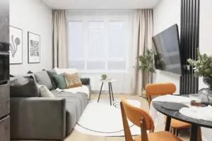 Schastlivyye Metry s Kaminom u Metro Rumyantsevo Apartments, Dudkino