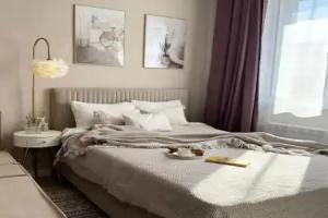 Na Ulitse Romantikov 1 Flat, Kogalym