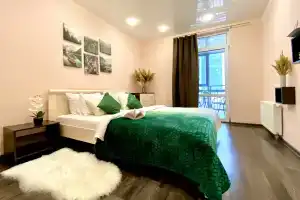 V tsentre s vidom na tantsuyushchii most i stadion Arena MAKrent Flat, Volgograd