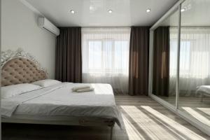 Na Kamzina 41/3 Apartments, Pavlodar