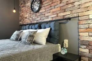 With Clock in Loft Style Apartment, Elektrostal