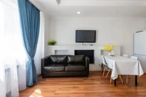 Uyut v Ritme Minimalizma Apartment, Almaty