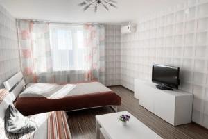 Na Ulitse Chervishevskiy Trakt 58 Flat, Tyumen