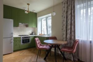 Stilnaya v centre Gatchiny s parkovkoj i garderobnoj Flat, Gatchina