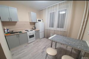 V Novostroyke Flat, Kurgan