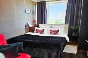 Studiya v Mikrorayone Stroiteley Apartments, Novy Urengoy