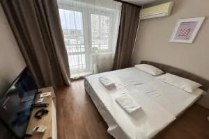 V Gosti! Na Stroitelei 90B (Studia na 2 etazhe) Apartments, Novokuznetsk