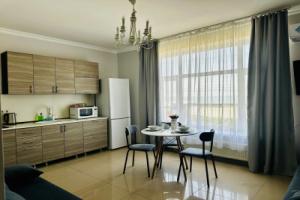 Uyutnaya Studiya Na 1 Linii V Adlere Apartments, Adler