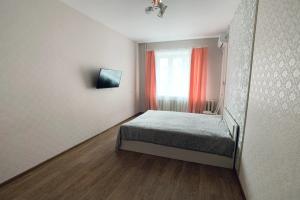 V Tsentre Goroda Flat