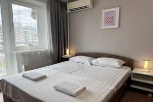 V Gosti! Na Stroitelei 90B ( Studia na 6 etazhe) Apartments, Novokuznetsk