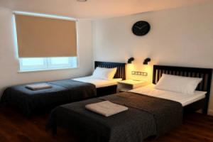 S Kukhney i 2 Otdelnymi Krovatyami Apartments, Kandalaksha