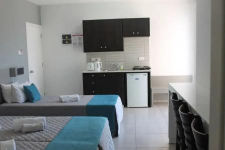 A. Maos Apartments - 70