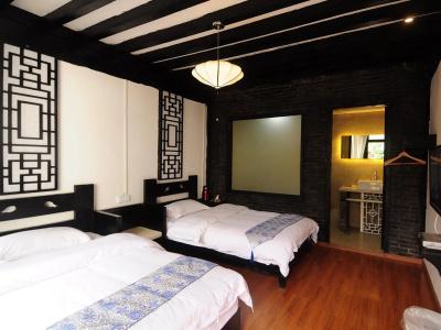 Lijiang Warm Flowers Guesthouse - 1