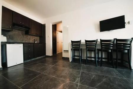 A. Maos Apartments - 91