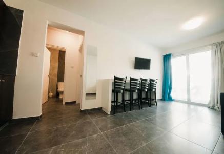 A. Maos Apartments - 64