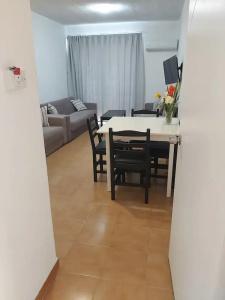 A. Maos Apartments - 83